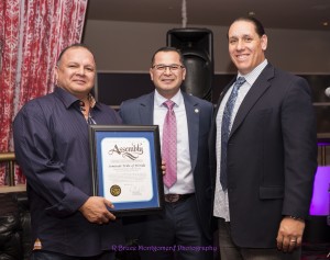 Manuel Perez Campaign Fundraiser at Hard-Rock Palm Springs Tony Sanchez Vice Chairman of Seminole Tribe of Florida holding certificate for opening of Hard-Rock Hotel with Assemblyman Perez and Jeff Grubbe Chairman of Agua Caliente