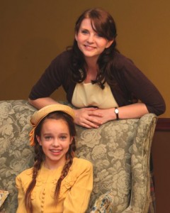On stage sisters Nora (Elizabeth Schmelling) and Laurie (Madison Tuttle) pose on the set of Brighton Beach Memoirs.